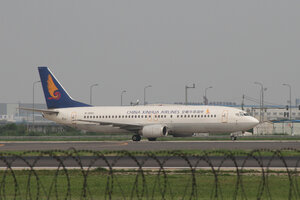 date：2010-07-24;
location：Beijing Capital Intl Airport - ZBAA;
airline：China Xinhua Airlines - CXH;
registration：B-2993;
aircraft：B737-400