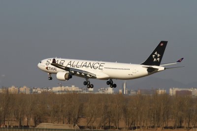 date：2010-02-03location：Beijing Capital Intl Airport - ZBAAairline：Thai Airways - THAregistration：HS-TELaircraft：A330-300remark：Star Alliance Livery