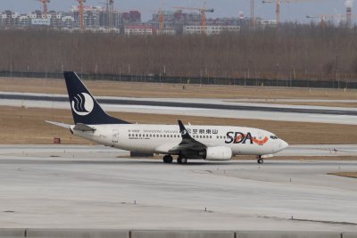 date：2010-02-10location：Beijing Capital Intl Airport - ZBAAairline：Shandong Airlines - CDGregistration：B-5207aircraft：B737-700